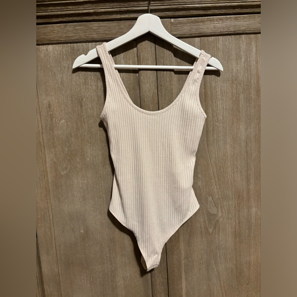 Whole new JONATHAN SIMHAI T-Back bodysuit. Size small
